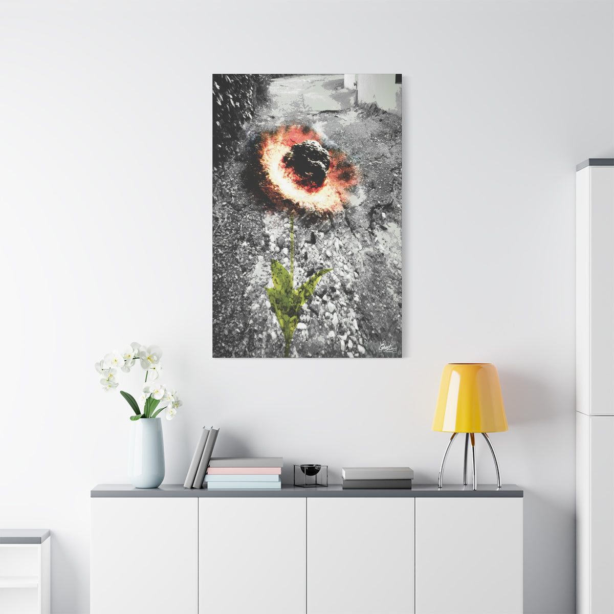 Meteor Flower large canvas above a white sideboard and yellow lamp, meteor-like bloom of fiery color in broken asphalt
