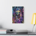 Purple Voodoo large canvas beside a yellow desk lamp, haloed face in a blue, purple and pink newspaper collage