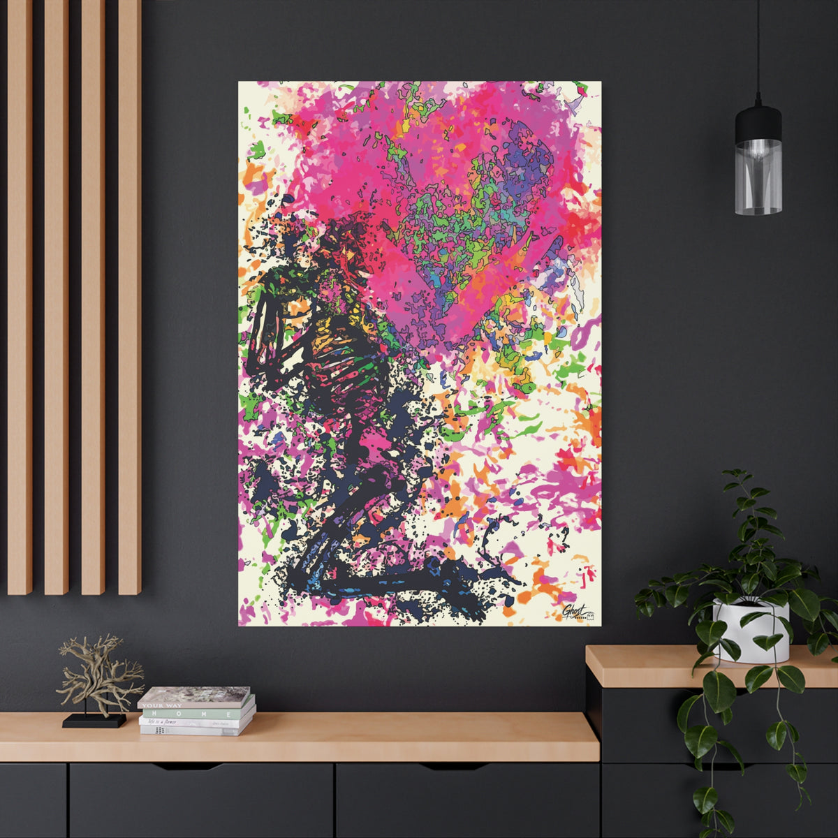 Waiting on My Love oversized canvas on a charcoal wall by wood slats, kneeling skeletal figure under a fuchsia splatter heart