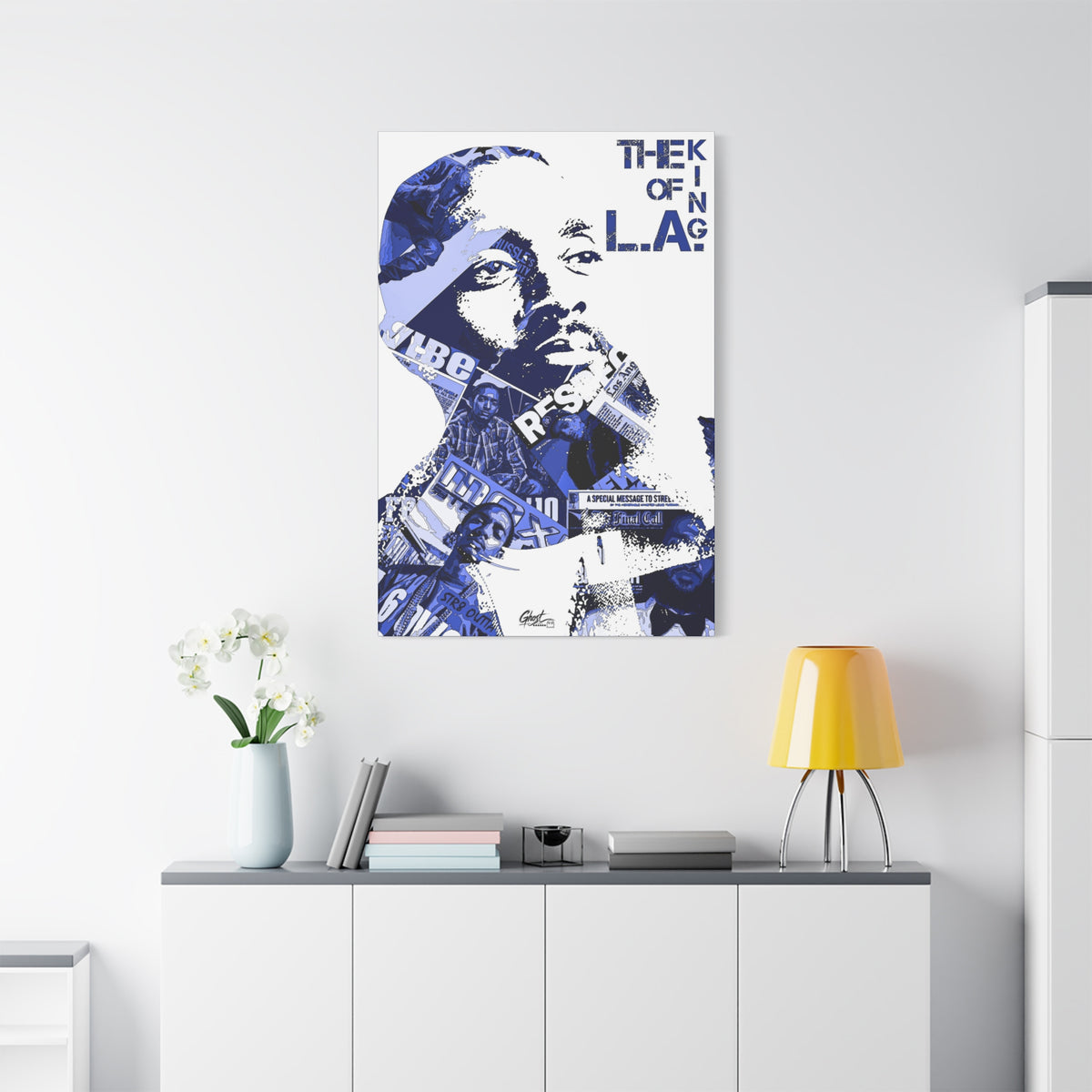 Crown of the Coast medium canvas on a white wall over a sideboard, blue collage portrait on white with bold text