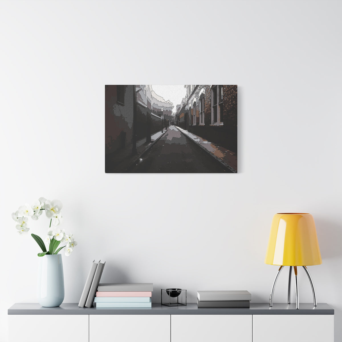 Charleston One Way oversized canvas on a white wall above a console, narrow one-way alley in dark, muted tones