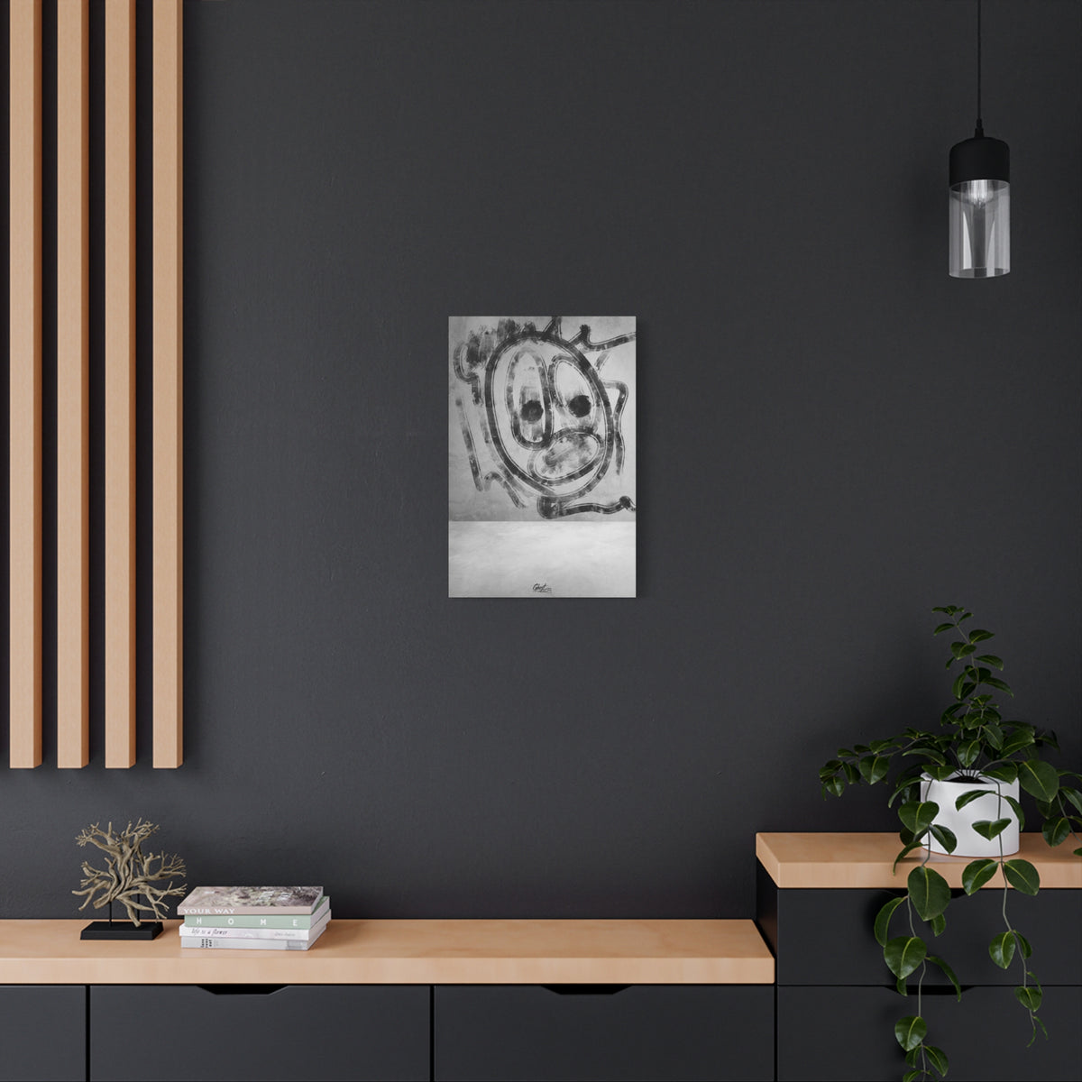 Thinking Out Loud medium canvas on a charcoal wall by wood slats, black-and-white abstract face with blurred edges