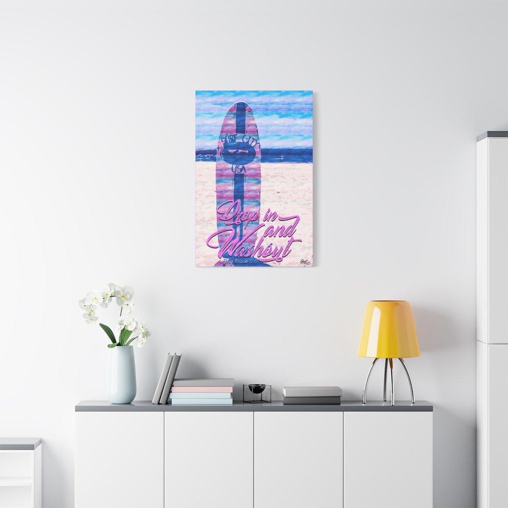 Drop In and Wash Out, Folly Beach canvas above a white sideboard and yellow lamp, pastel surfboard with script lettering