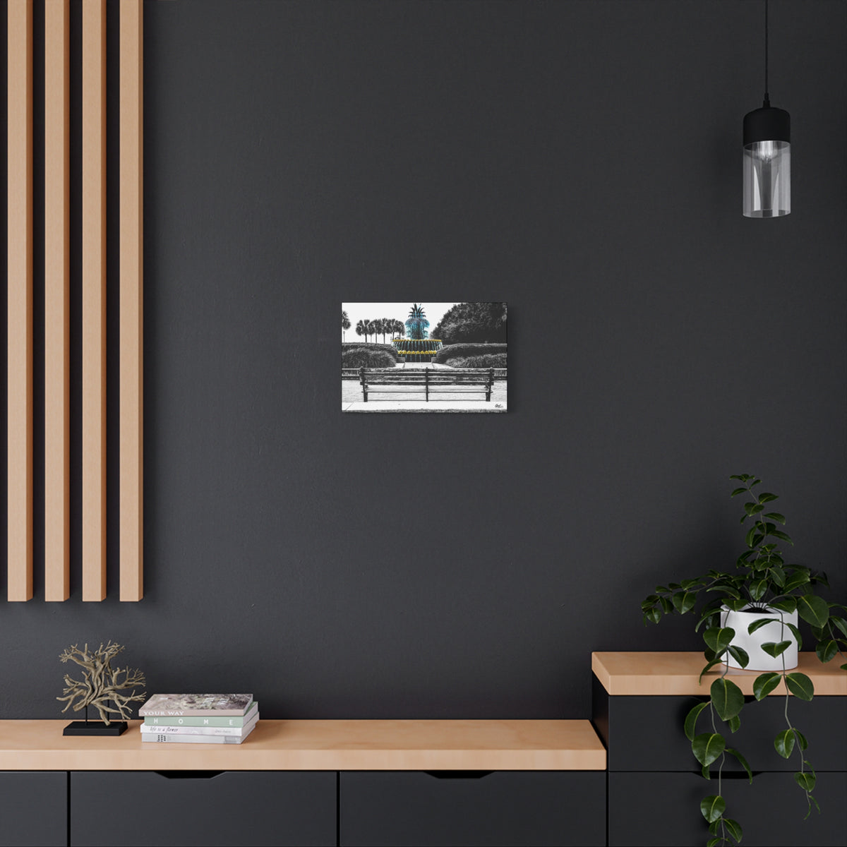 The Pineapple of Peace canvas on a charcoal wall over an oak shelf, Southern hospitality pineapple in soft grays and greens