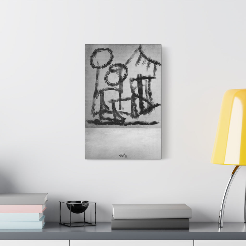 The Question small canvas beside a yellow desk lamp, hand-brushed black arcs reading as figures and a horizon