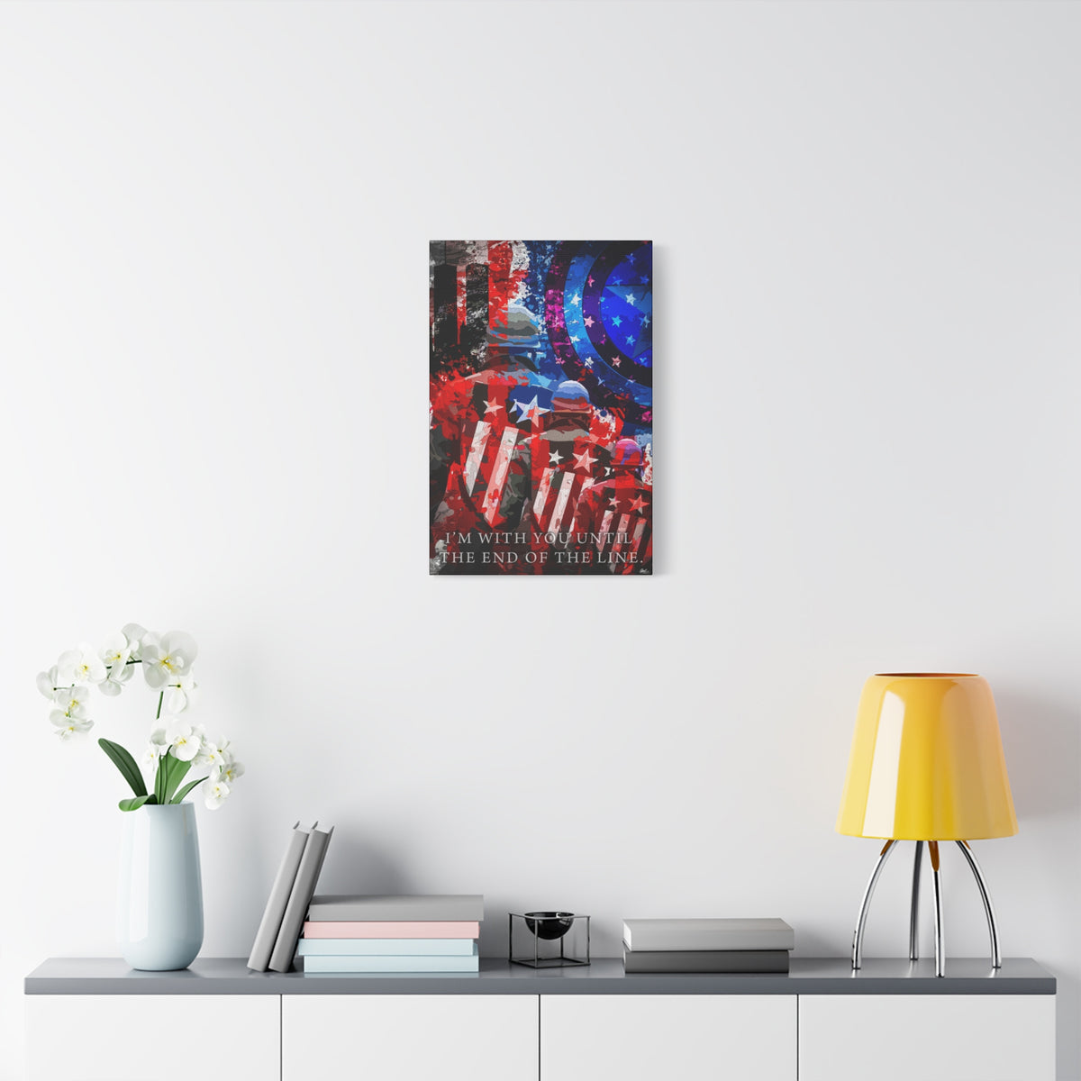 9/11 Never Forget medium canvas over a console with white flowers, patriotic tribute in red, white, blue and smoke gray