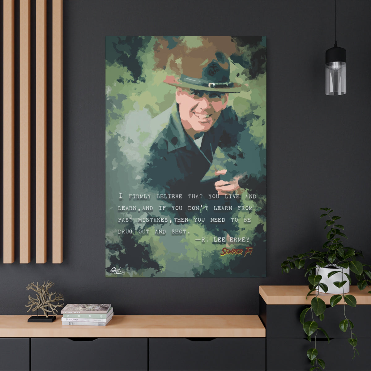 Live and Learn oversized canvas on a charcoal wall by wood slats, grinning drill instructor in olive and forest green