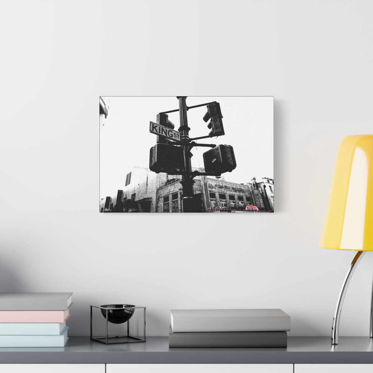 King St large canvas beside a yellow desk lamp, black-and-white King Street signals and the Riviera Theatre