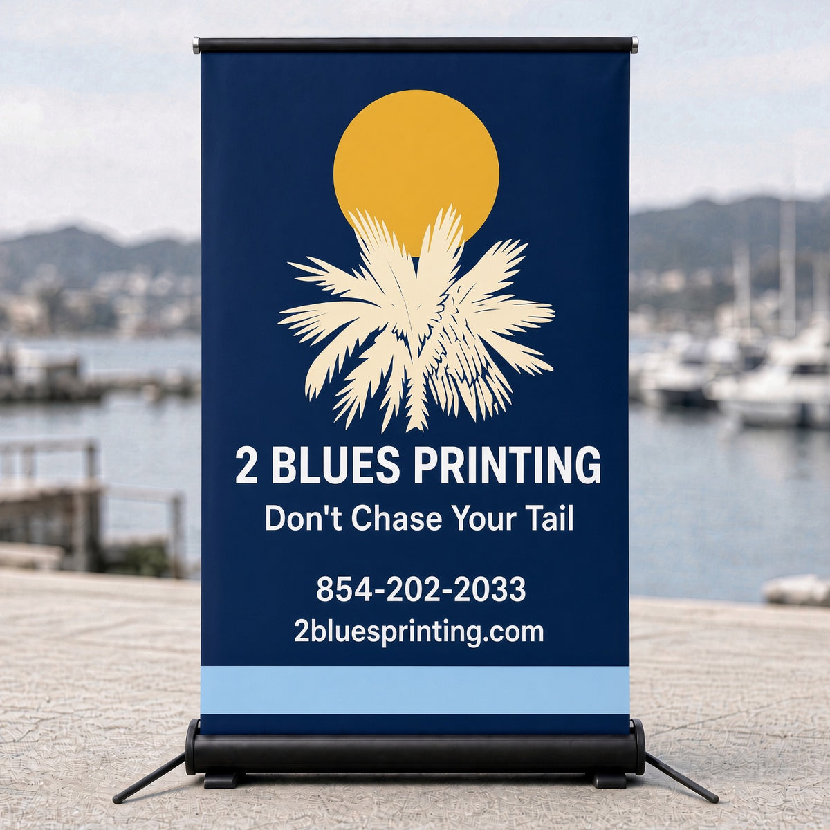 Custom Banners: 2 Blues Printing navy retractable banner with palm logo and phone number by the harbor