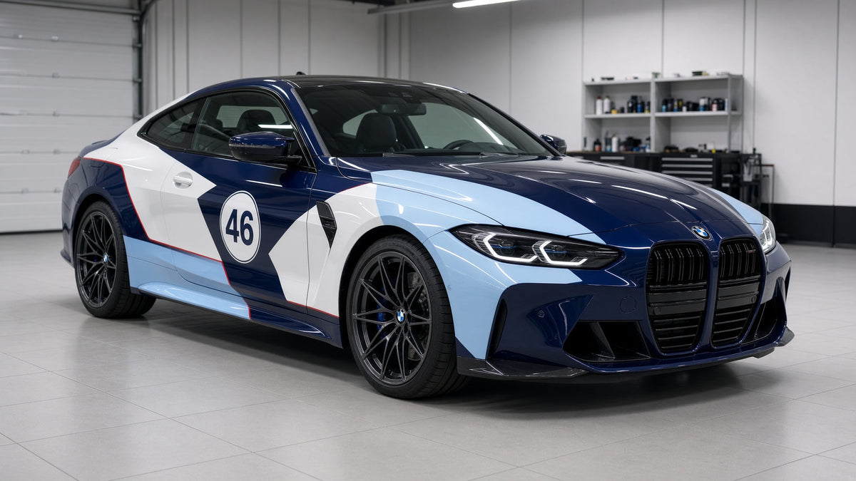 BMW coupe in a navy, white, and ice-blue number 46 livery